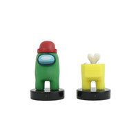 Two crewmate stampers: green figure with red cap and yellow figure with white heart, black base