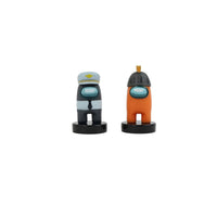 Two crewmate stampers: light blue with cap emblem and orange in dark cap
