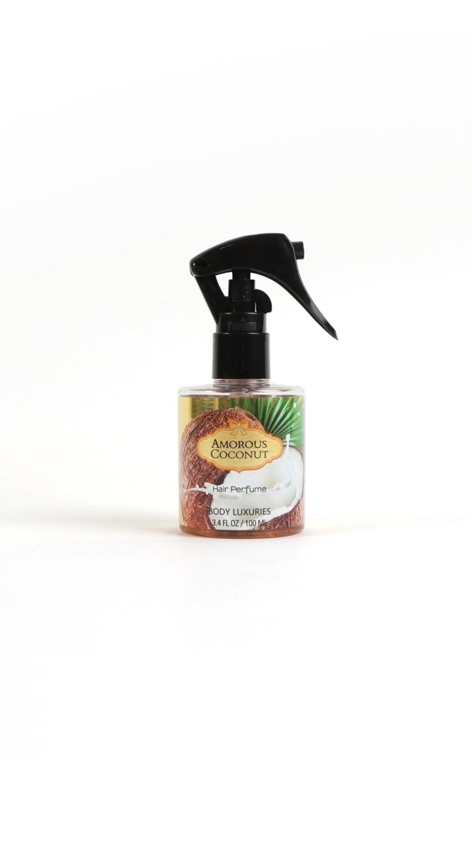 Hair perfume spray bottle with black trigger, amber liquid, coconut-themed label