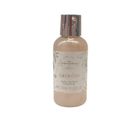 Bubble bath bottle with metallic cap and floral label