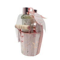 Bath gift set bucket with ribbon, holding assorted bottles and body care items