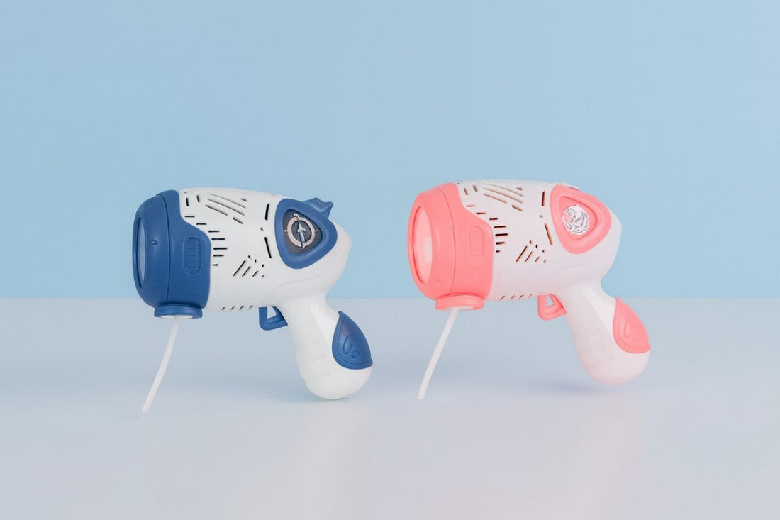 Kids automatic bubble gun toy, blue and white handheld with nozzle and tube
