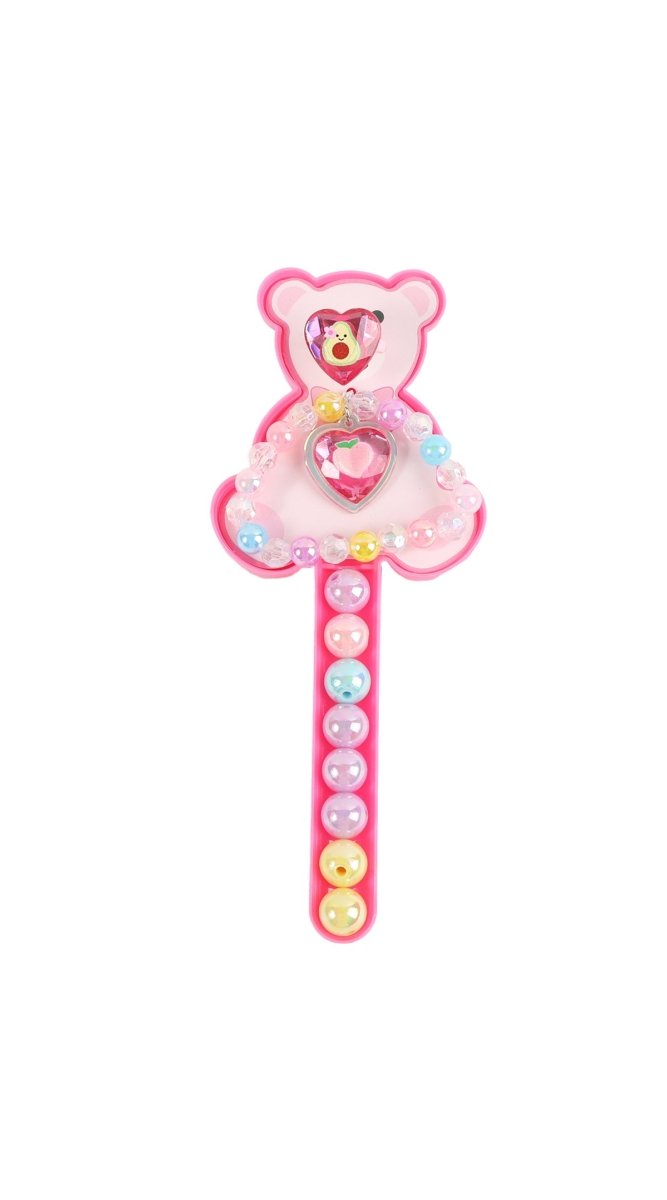 Pink teddy bear rattle with heart centerpiece and rainbow bead handle