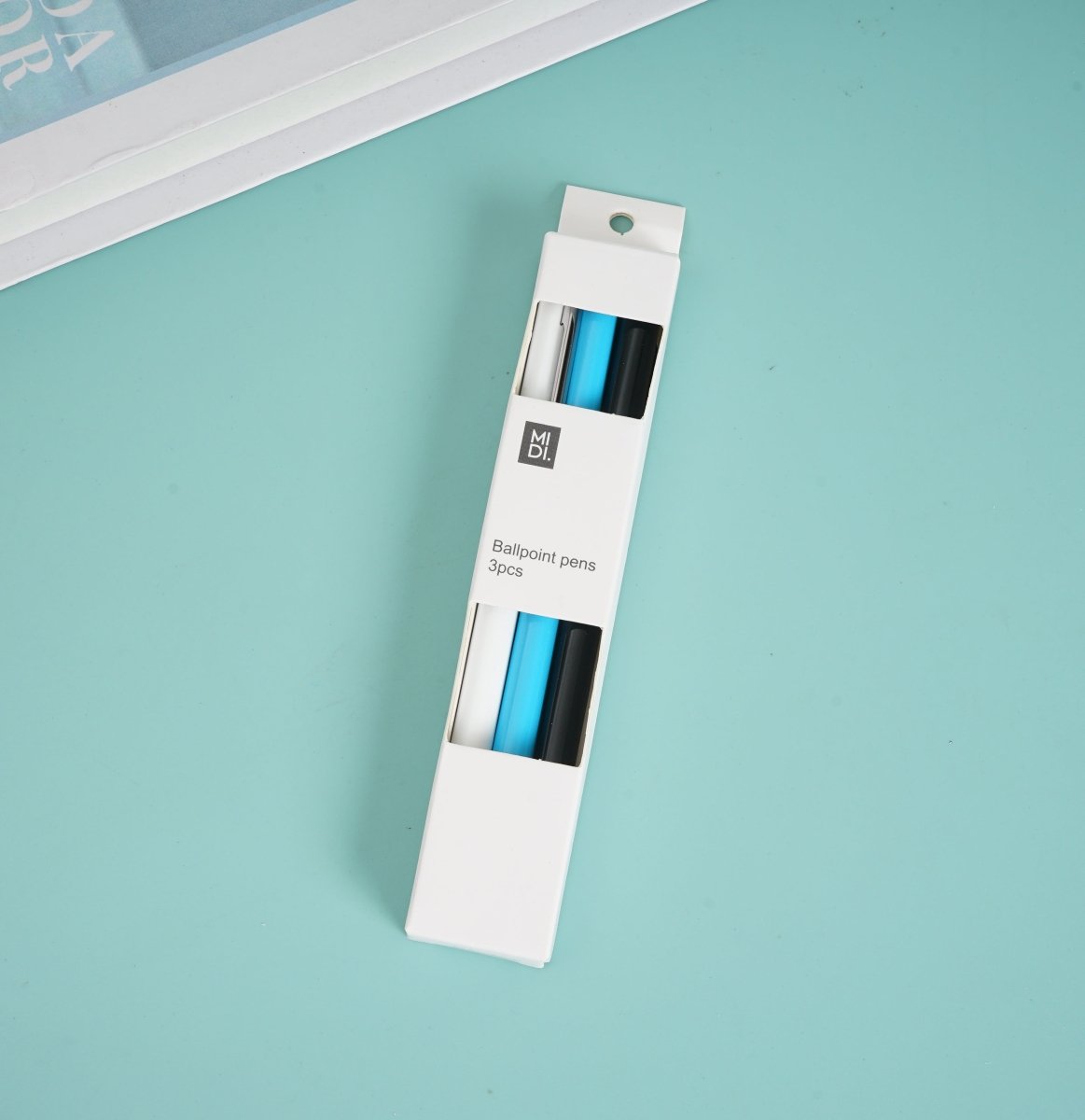 Ballpoint pen set in white box with blue and black pens