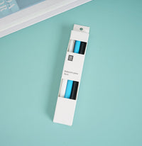 Ballpoint pen set in white box with blue and black pens