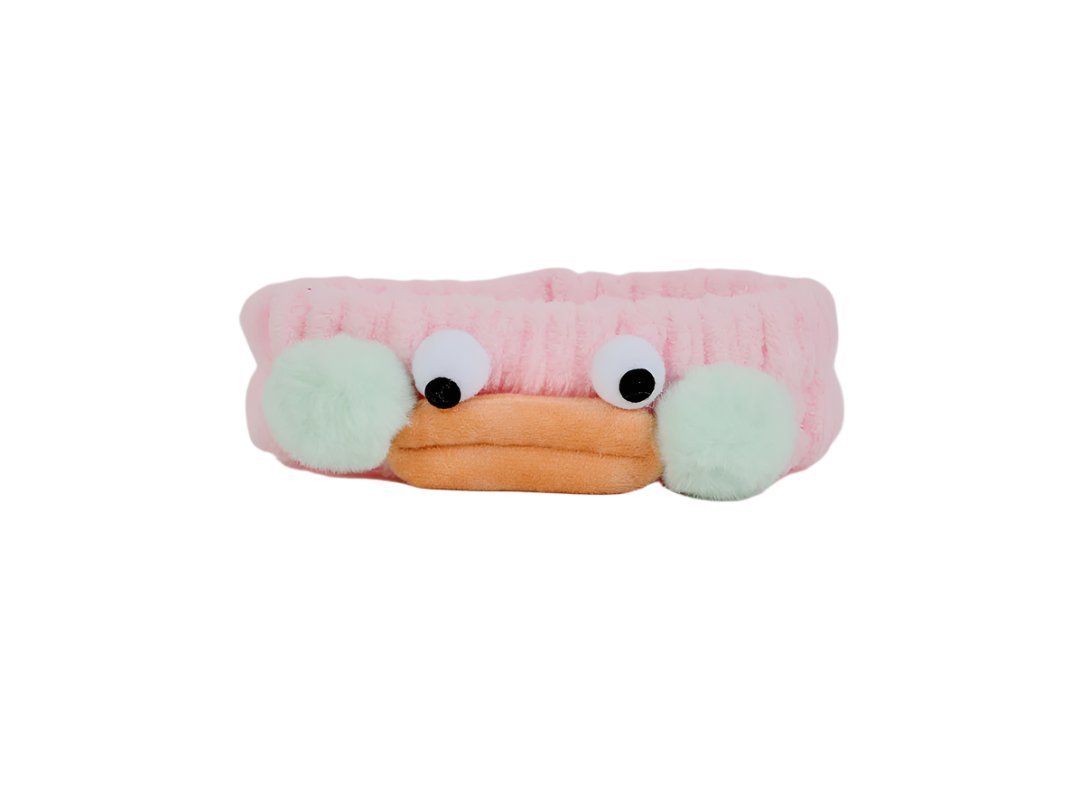 Pink plush animal big-eye headband with mint side pads and orange beak