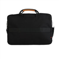 Black canvas laptop bag, rectangular front panel, top handle with tan trim
