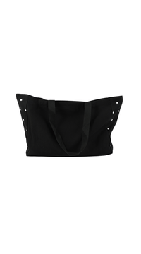 Black dot tote bag with open top and draped front, white dot accents