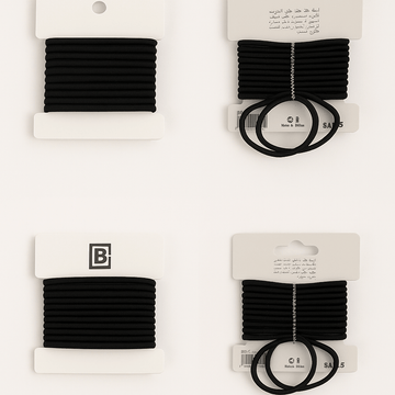 Elastic band set of black hair ties on retail cards, showing coiled bands and loops.