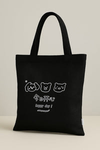 Black tote bag with three bear faces and 'happy day' text graphic on front