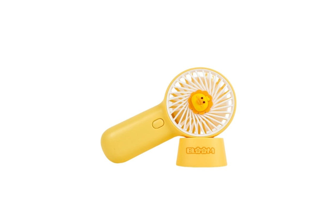 Yellow handheld mini fan with round front grille and flower emblem