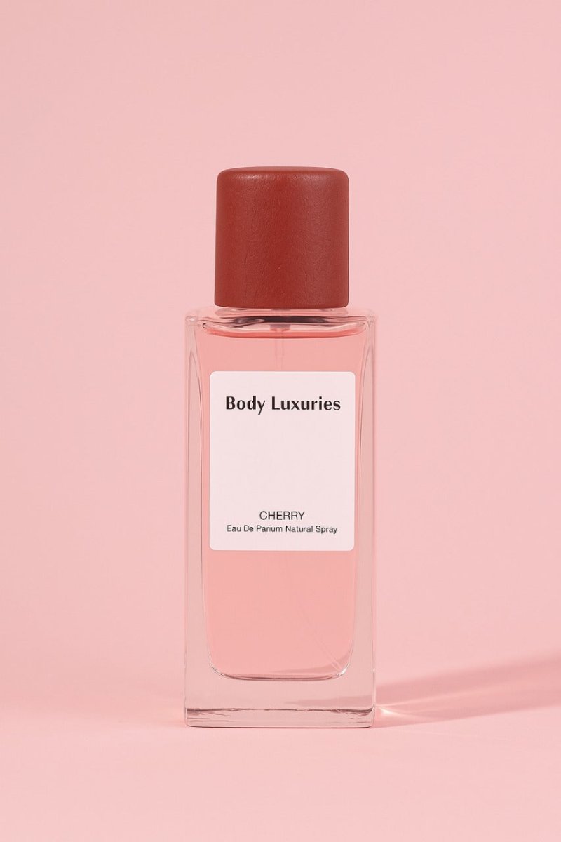 Cherry eau de parfum spray bottle with red cap, clear glass, Body Luxuries label
