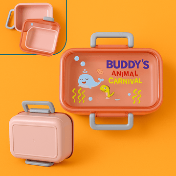 Pink kids lunch box with Buddy's Animal Carnival graphic and carry handle