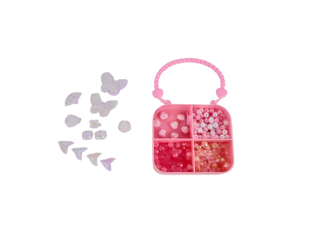 Pink bunny-shaped kids jewelry box with open bead compartments and carrying handle