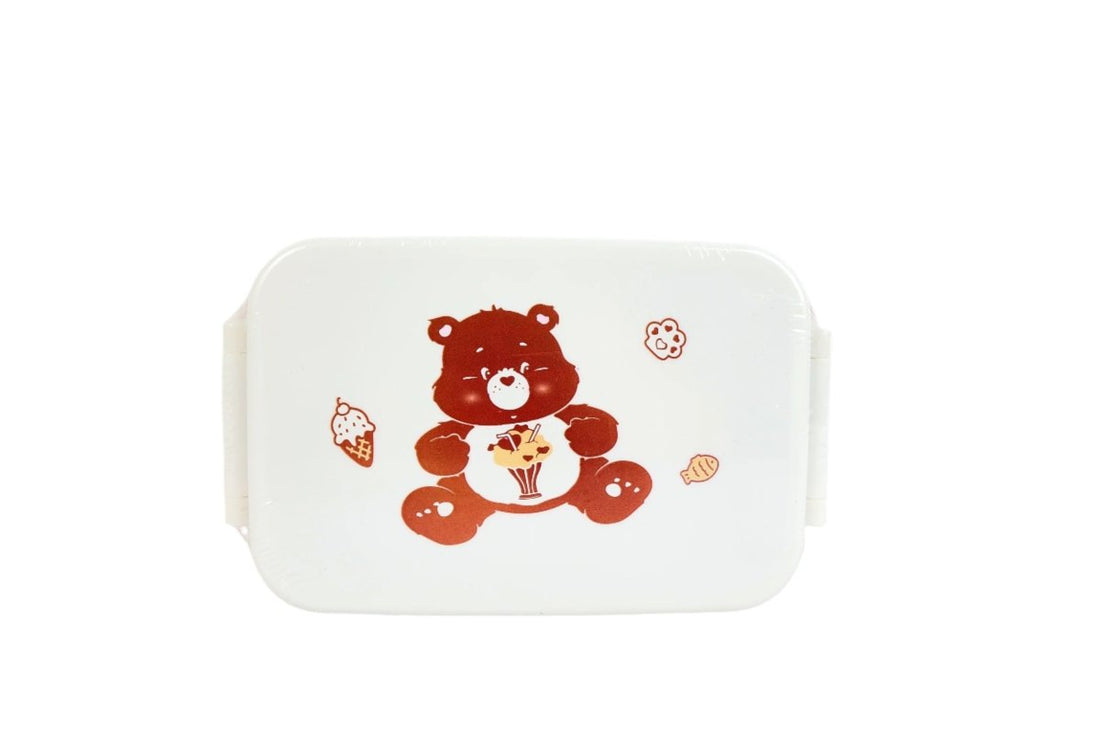 Kids lunch box with white body, brown bear graphic, hinged lid and side handle.