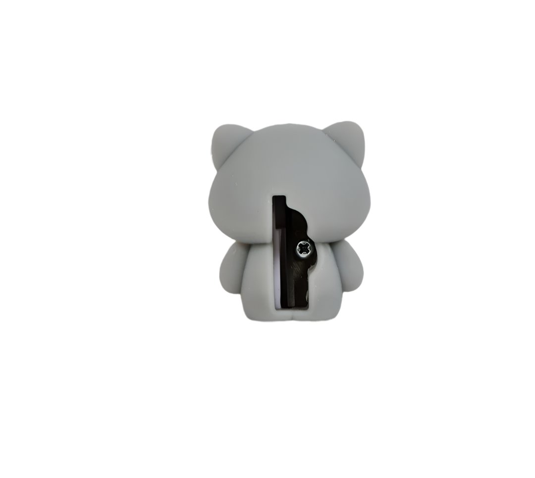 Gray cat-shaped pencil sharpener with exposed blade opening, back view