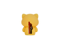Yellow cat-shaped pencil sharpener with open shaving blade cavity