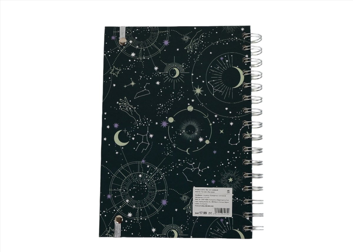 Celestial notebook back cover with spiral rings and star-chart symbols pattern.