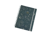 Celestial notebook with dark cover, spiral binding, and star-and-planet constellation print.
