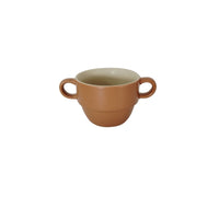 Brown ceramic cup with modern double handles and light inner surface
