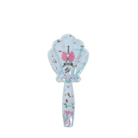 Plastic hair brush with shell-shaped bristles, light blue with pink bow print.