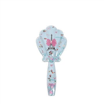 Plastic hair brush with shell-shaped bristles, light blue with pink bow print.