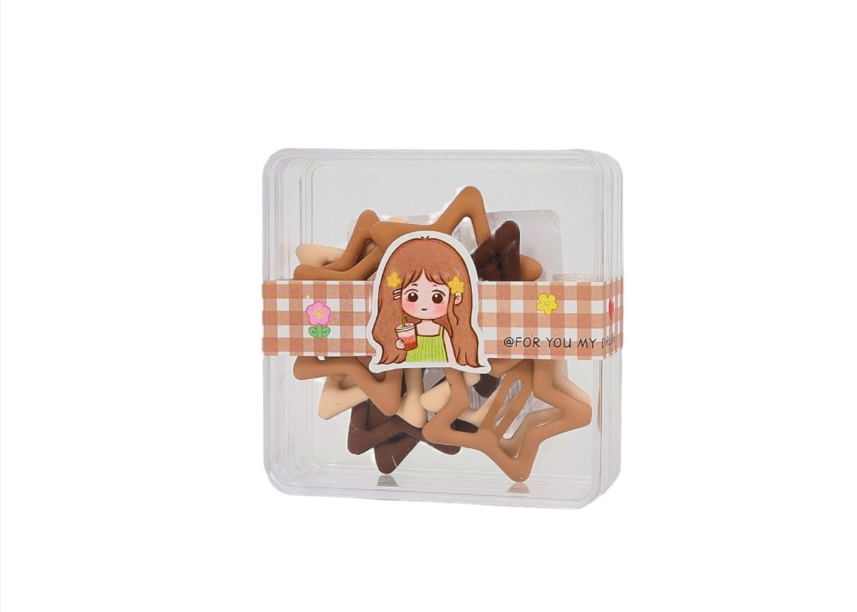 Star-shaped hair clips in neutral tones, packed in a clear plastic box.