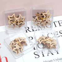 Star-shaped hair clips assorted in clear boxes, cream and dark star shapes.
