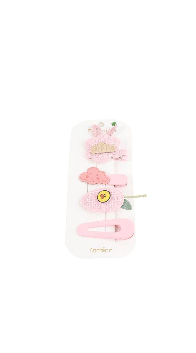 Children's hair accessory set with pink clips and flower-shaped pieces on a card