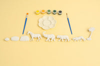 Animal painting craft kit with paint brushes, animal stencils, and color pots