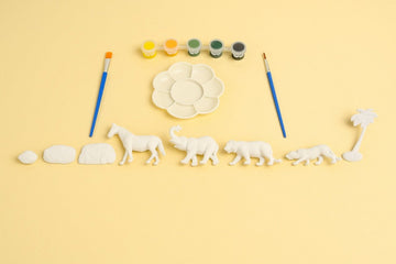 Animal painting craft kit with paint brushes, animal stencils, and color pots
