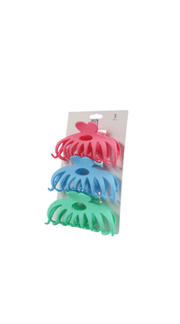 Plastic hair clips 3-pack on card: red, blue, and green claw-style clips