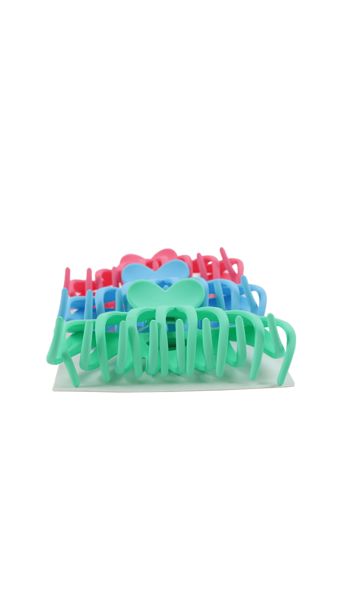 Plastic hair clips displayed: pink-red, blue, teal, and mint, heart-shaped tops