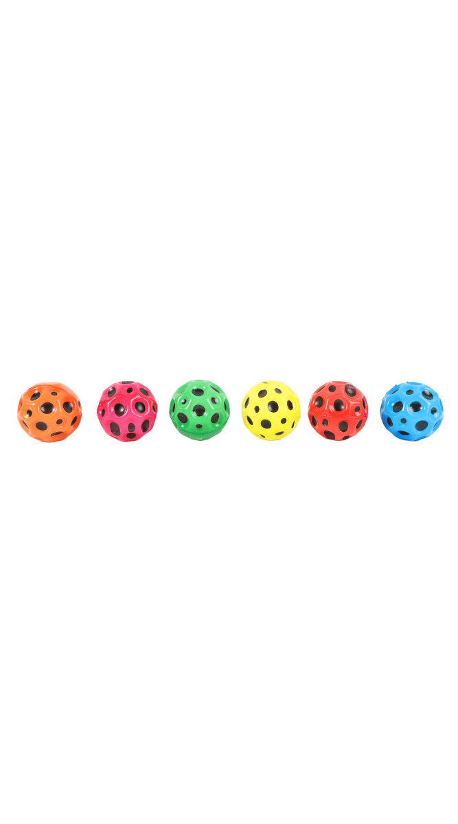 Set of colorful jumping balls lined up, perforated spheres in orange, pink, green, yellow, red, blue
