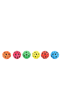 Set of colorful jumping balls lined up, perforated spheres in orange, pink, green, yellow, red, blue