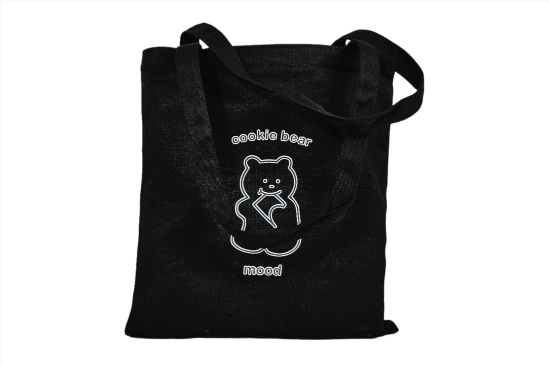 Black Cookie Bear tote bag with front bear logo and two carry handles