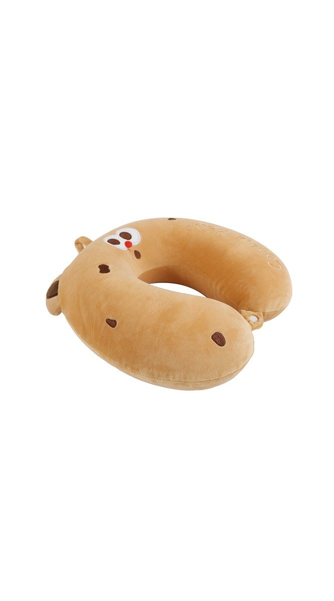 Plush travel neck pillow shaped like a cookie, with face patch and small ears