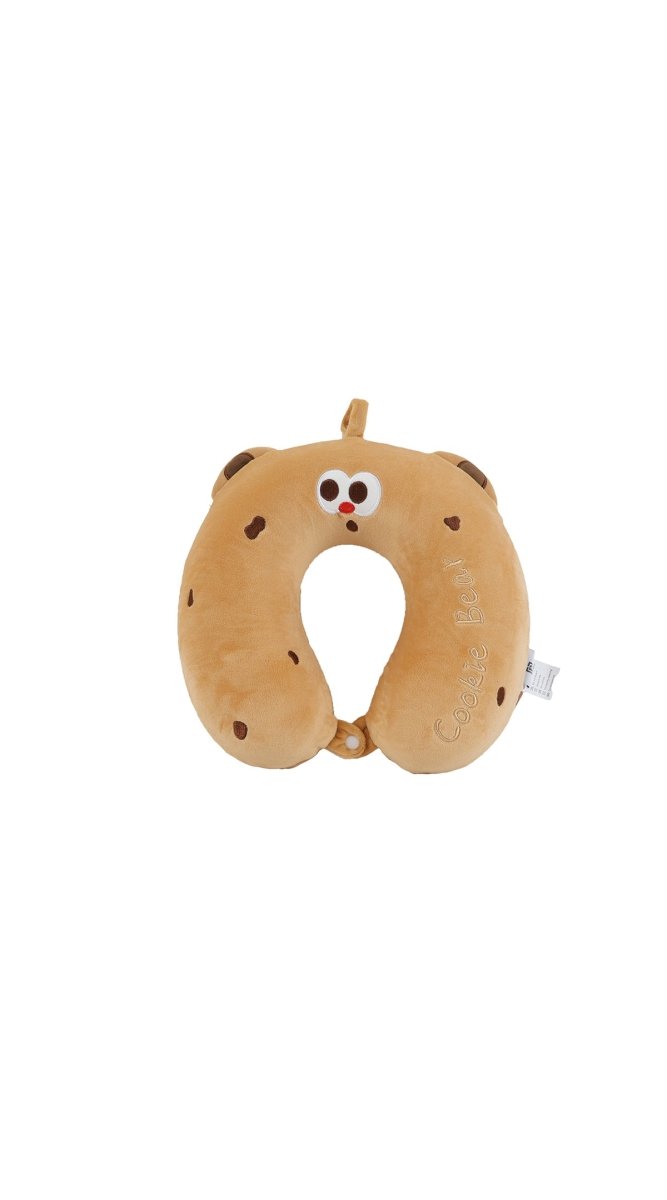 Plush travel neck pillow in cookie shape, embroidered face and care tag