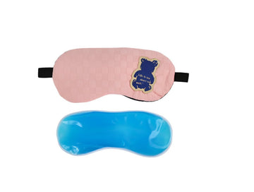 Pink sleeping blindfold with bear patch, black strap, blue cooling gel insert