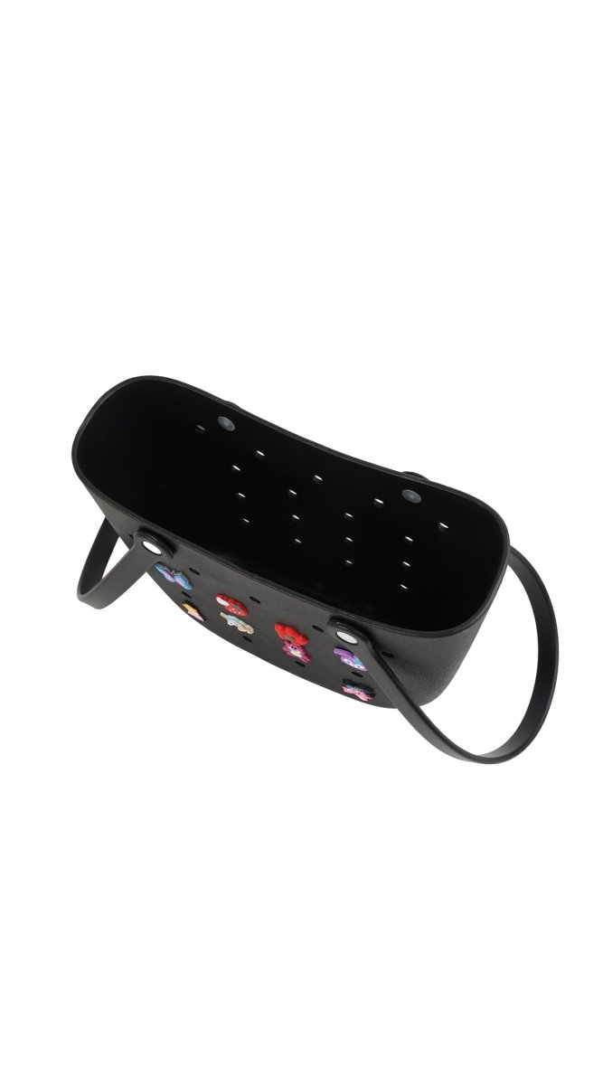 Black silicone kids bag with side strap and interior view, decorated with colorful charms