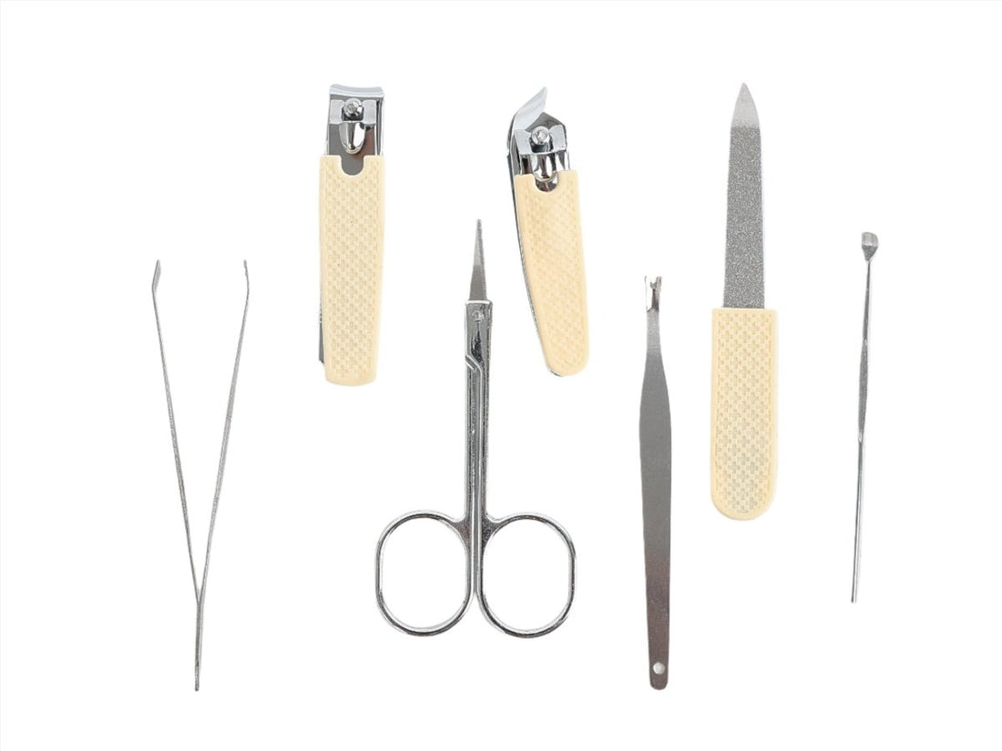 6-piece manicure tools laid out: clippers, scissors, file, tweezers, cuticle pusher