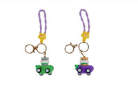 Animal food cart keychain with purple strap, green car charm, split keyring
