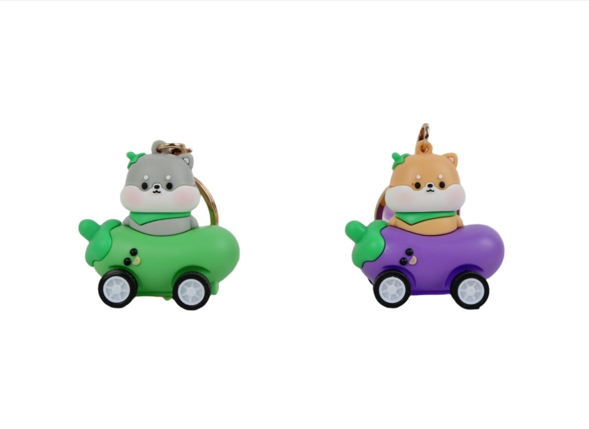 Animal food cart keychain pair: gray and tan heads on green and purple cars