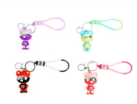 Set of four silicone astronaut bear keychains with different colored straps and bears