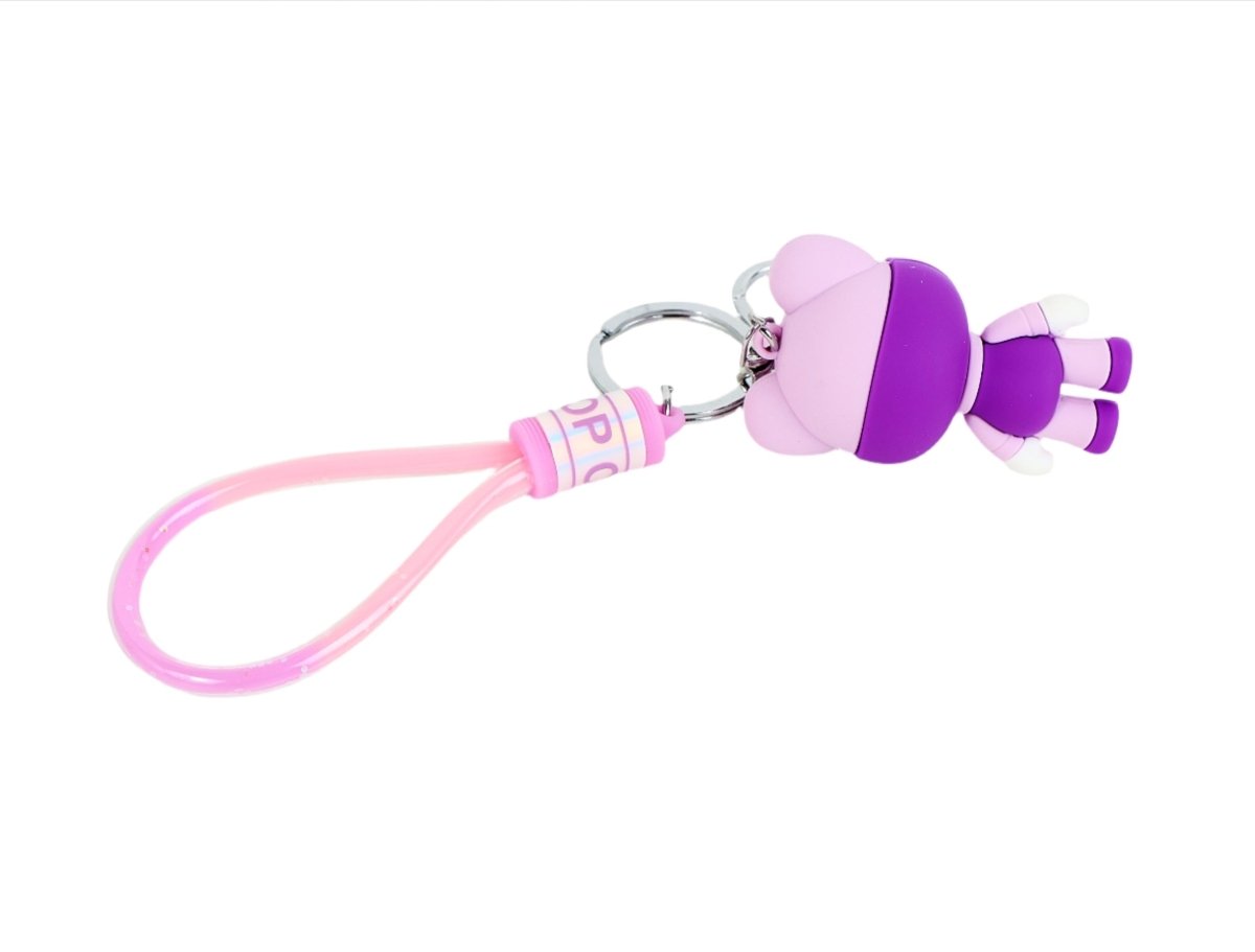 Purple astronaut bear silicone keychain on pink strap with silver keyring