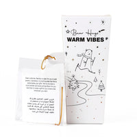 Bear-themed mug kit pouch with Warm Vibes graphic and bear illustration, brown and white