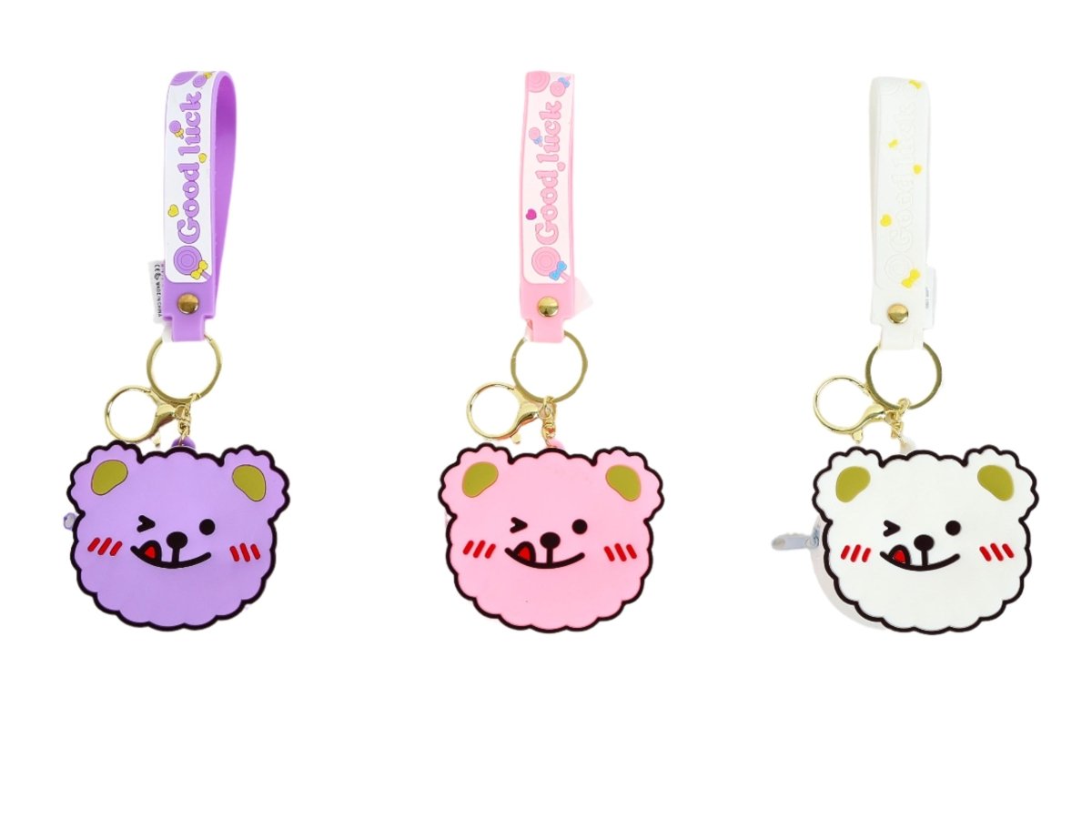 3 bear coin purse keychains on lanyards: purple, pink, and white faces with gold rings