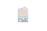 Compact mirror cover with cute bear face, pastel clouds, and colorful heart accents.