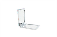 Compact mirror opened with reflective lid and base tray, showing metal hinge.