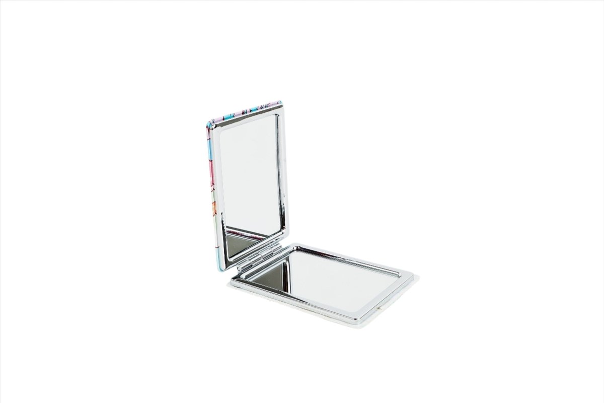 Compact mirror opened flat with clear reflective surface and hinged metal frame.